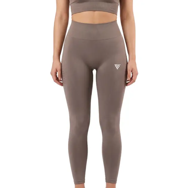 Female model wearing taupe seamless training leggings