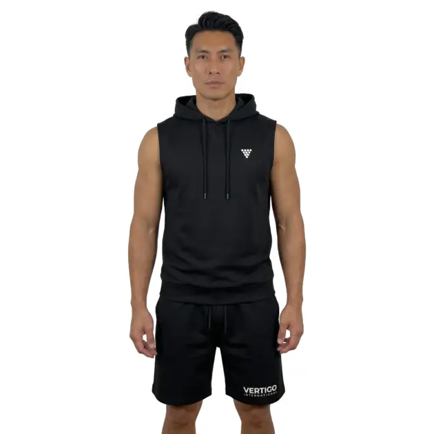 Male model wearing black sleeveless training set