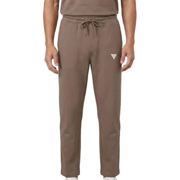 Male model wearing taupe gym jogger pants