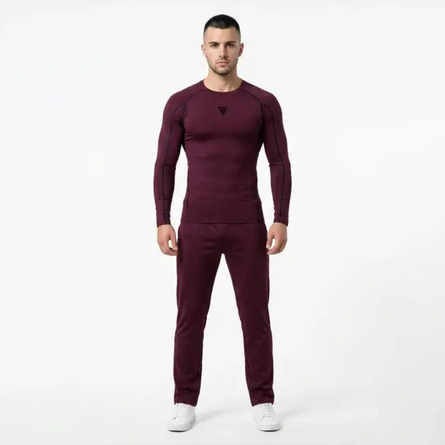 Close-up view of compression shirt and trouser set with athletic fit and stretch waistband