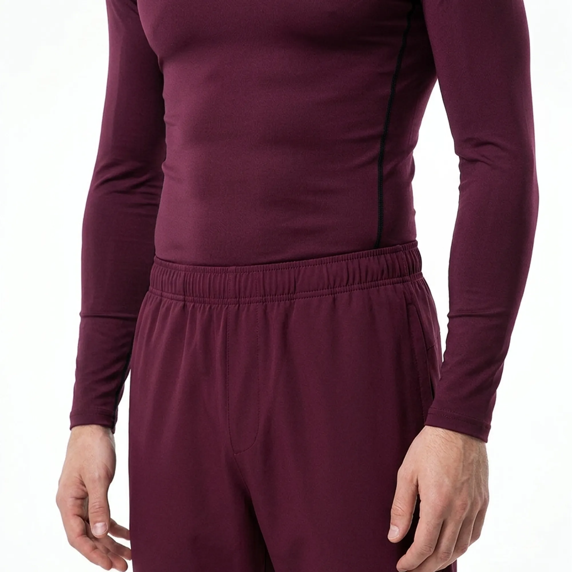 Men wearing compression shirt and trouser set designed for training and fitness performance