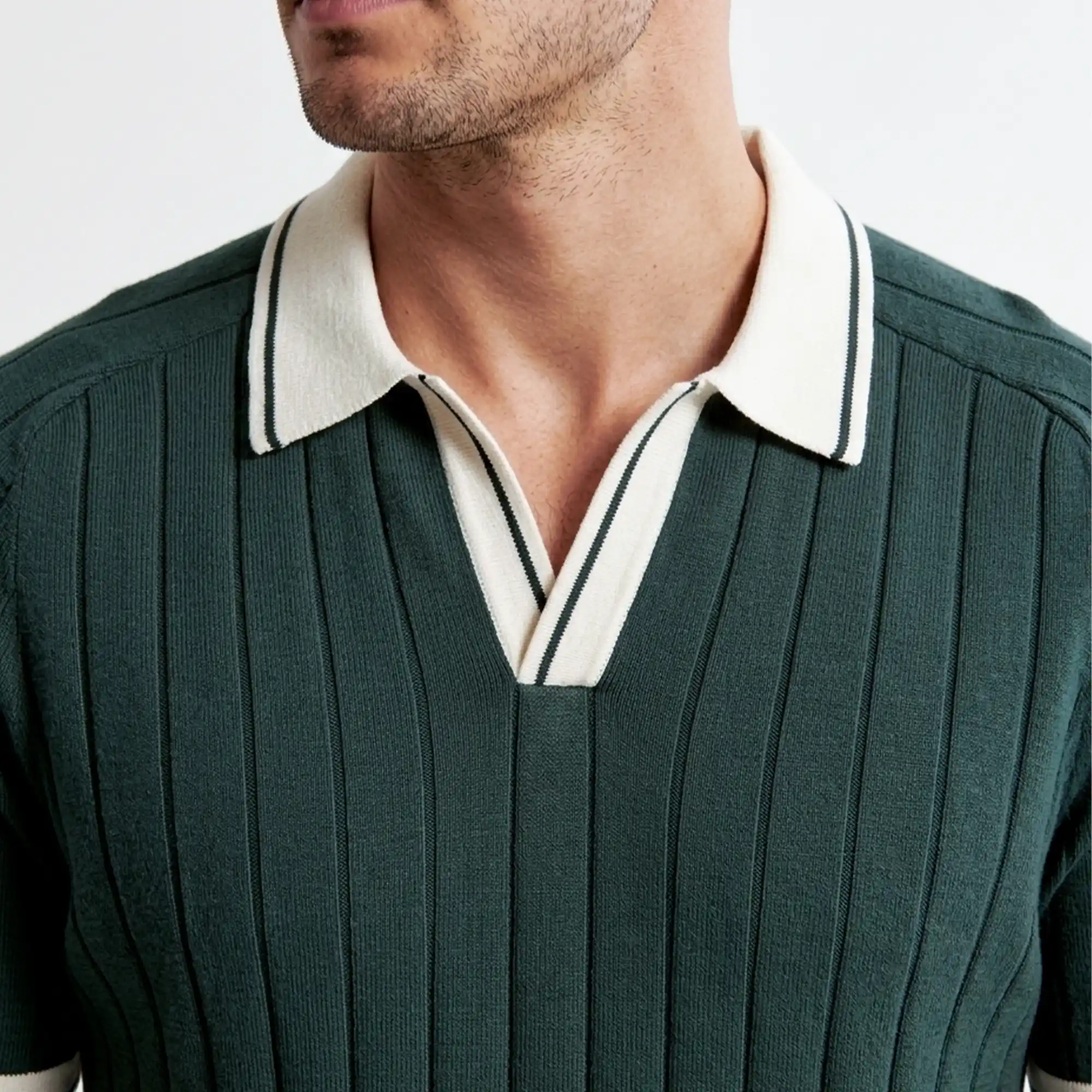 Men's green ribbed polo shirt with contrast collar detail