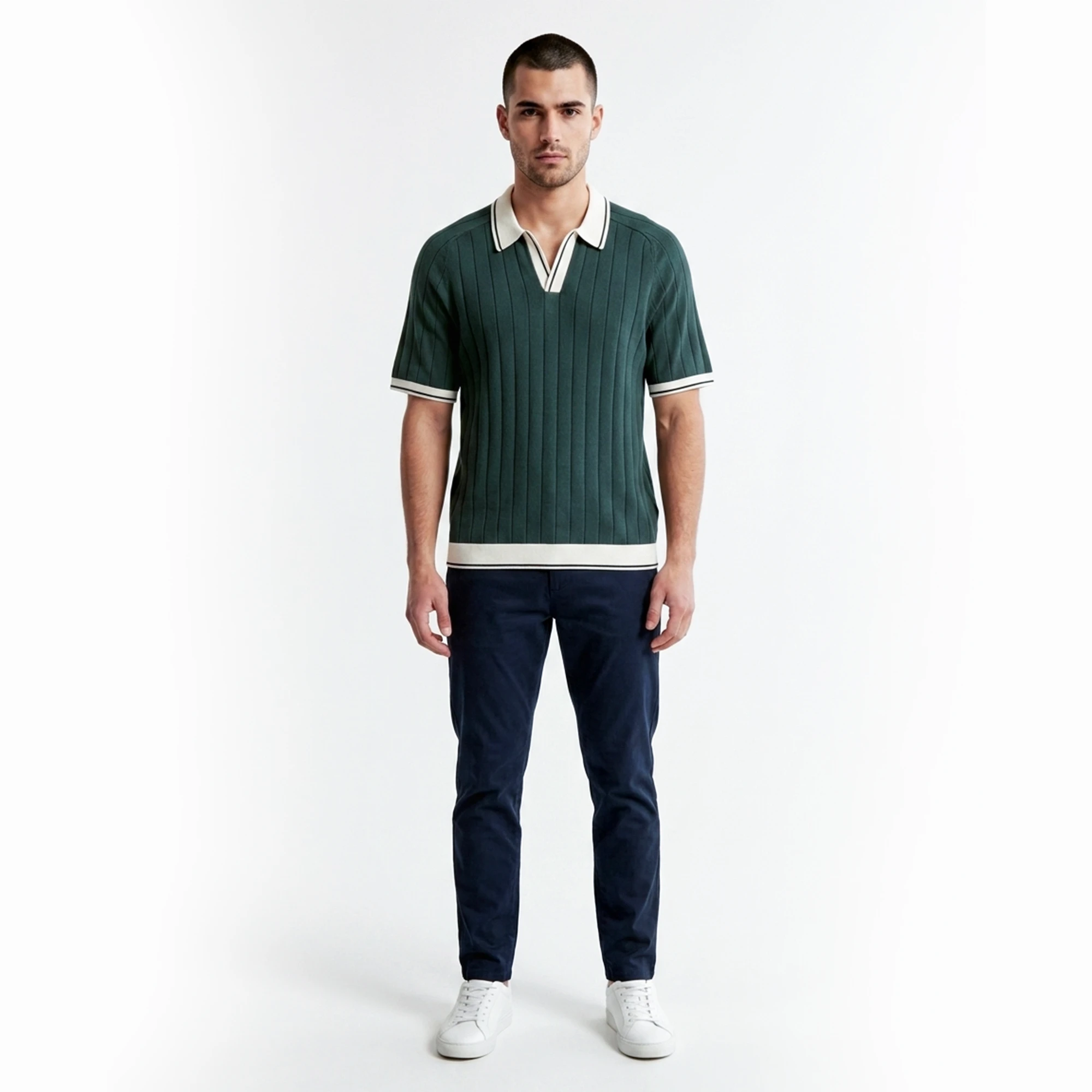 Front view of men's green ribbed polo shirt in casual wear