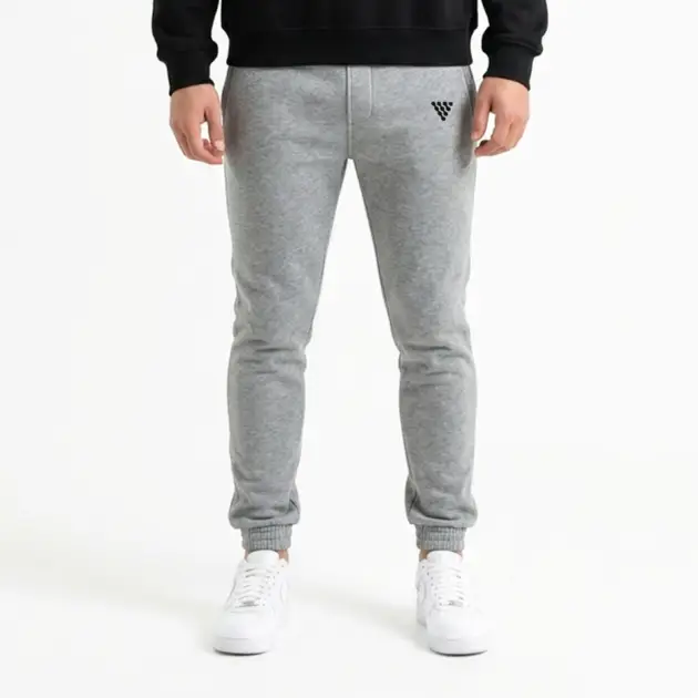 Men's grey jogger trousers styled for casual everyday wear