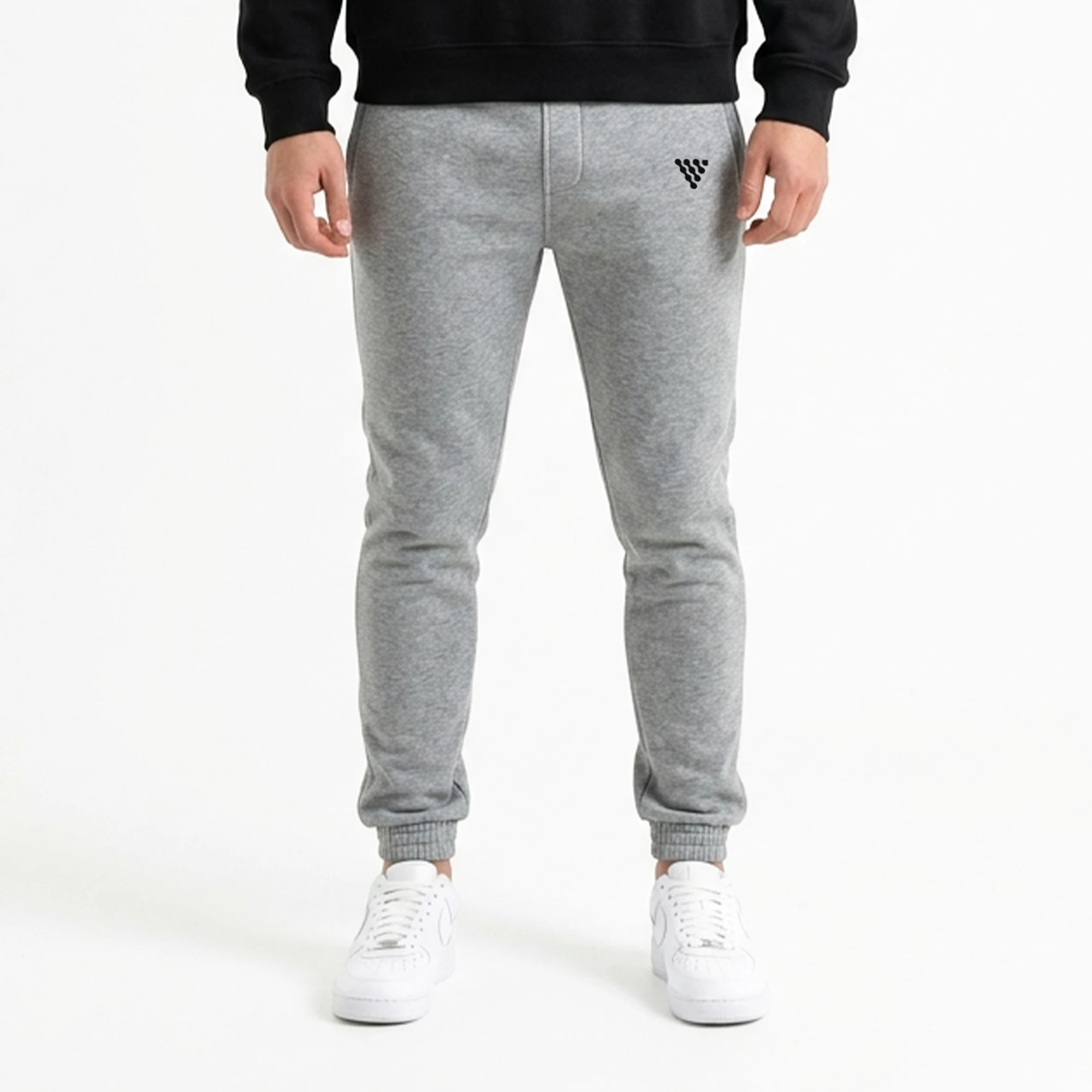 Men's grey jogger trousers styled for casual everyday wear
